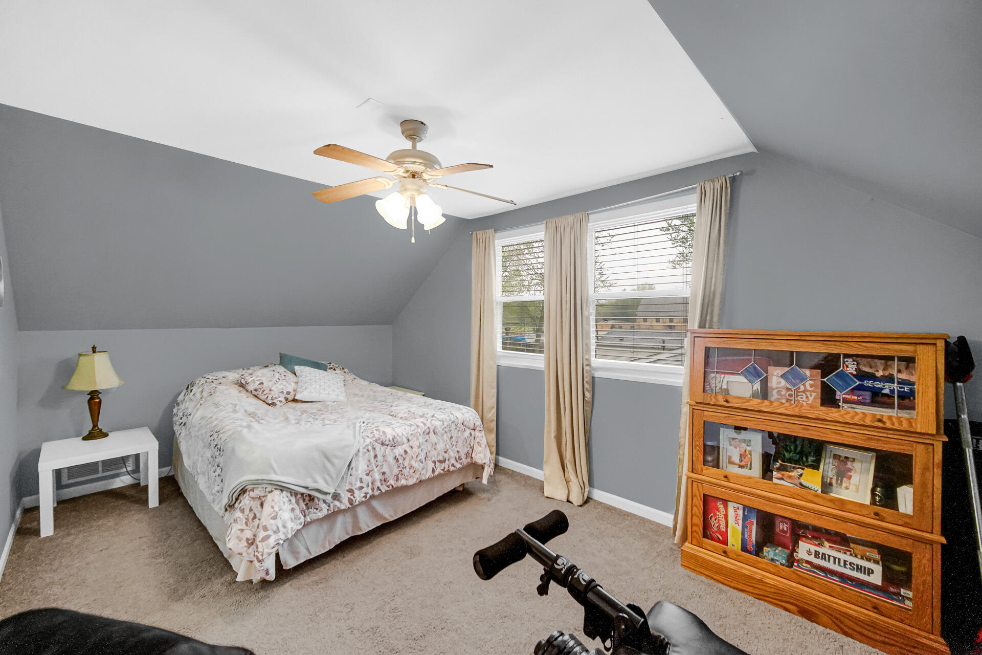 705 Juniper Road Valparaiso, IN 46385 - Photo 14 of 21 a bedroom with furniture and a book shelf