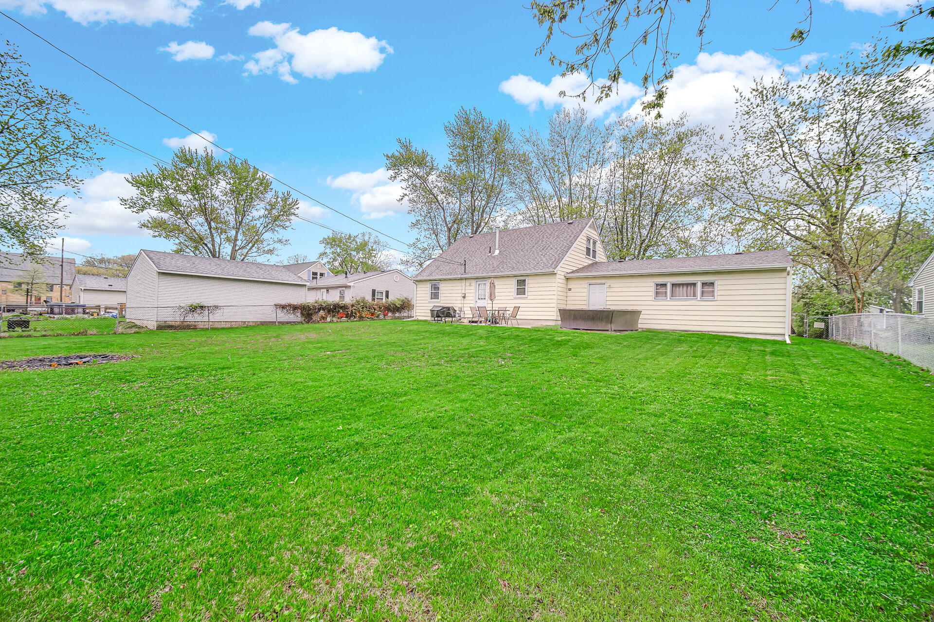 705 Juniper Road Valparaiso, IN 46385 - Photo 18 of 21 a house view with a sitting space and garden