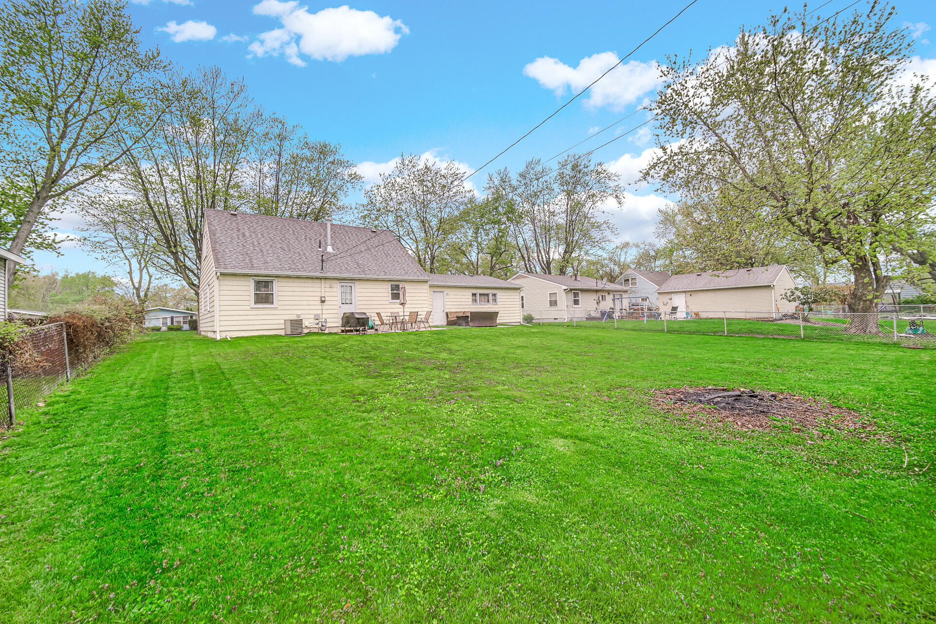 705 Juniper Road Valparaiso, IN 46385 - Photo 19 of 21 a view of a house with a yard and sitting area