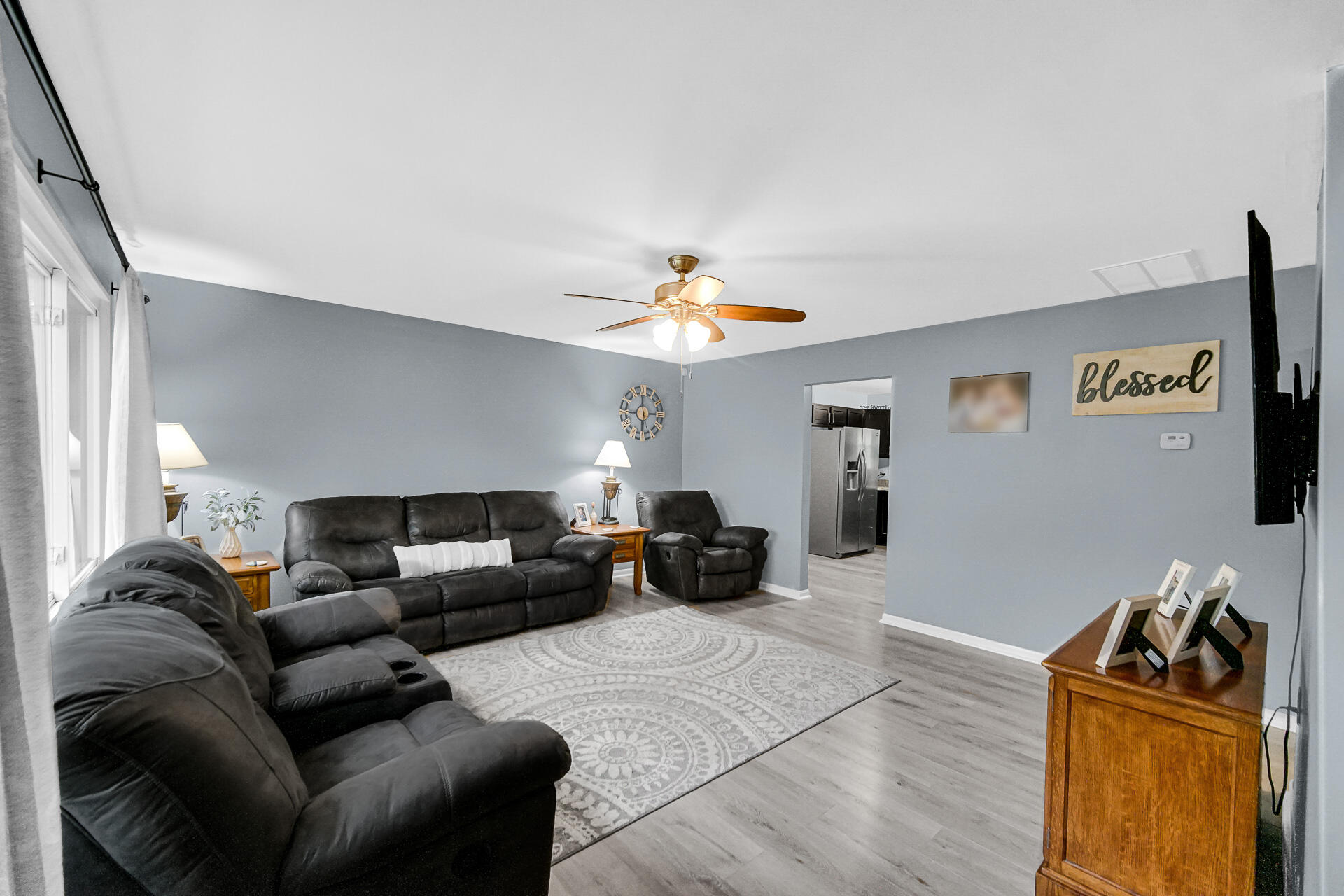 705 Juniper Road Valparaiso, IN 46385 - Photo 2 of 21 a living room with furniture and a flat screen tv
