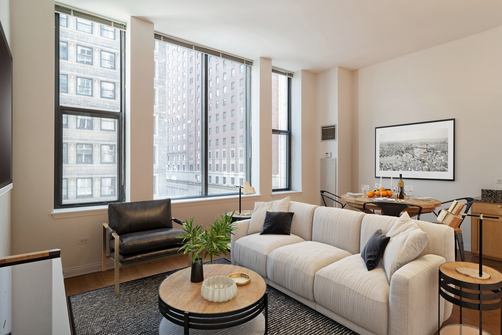 8 West Monroe Street, Unit 705 Chicago, IL 60603 - Photo 2 of 10 a living room with furniture and a large window