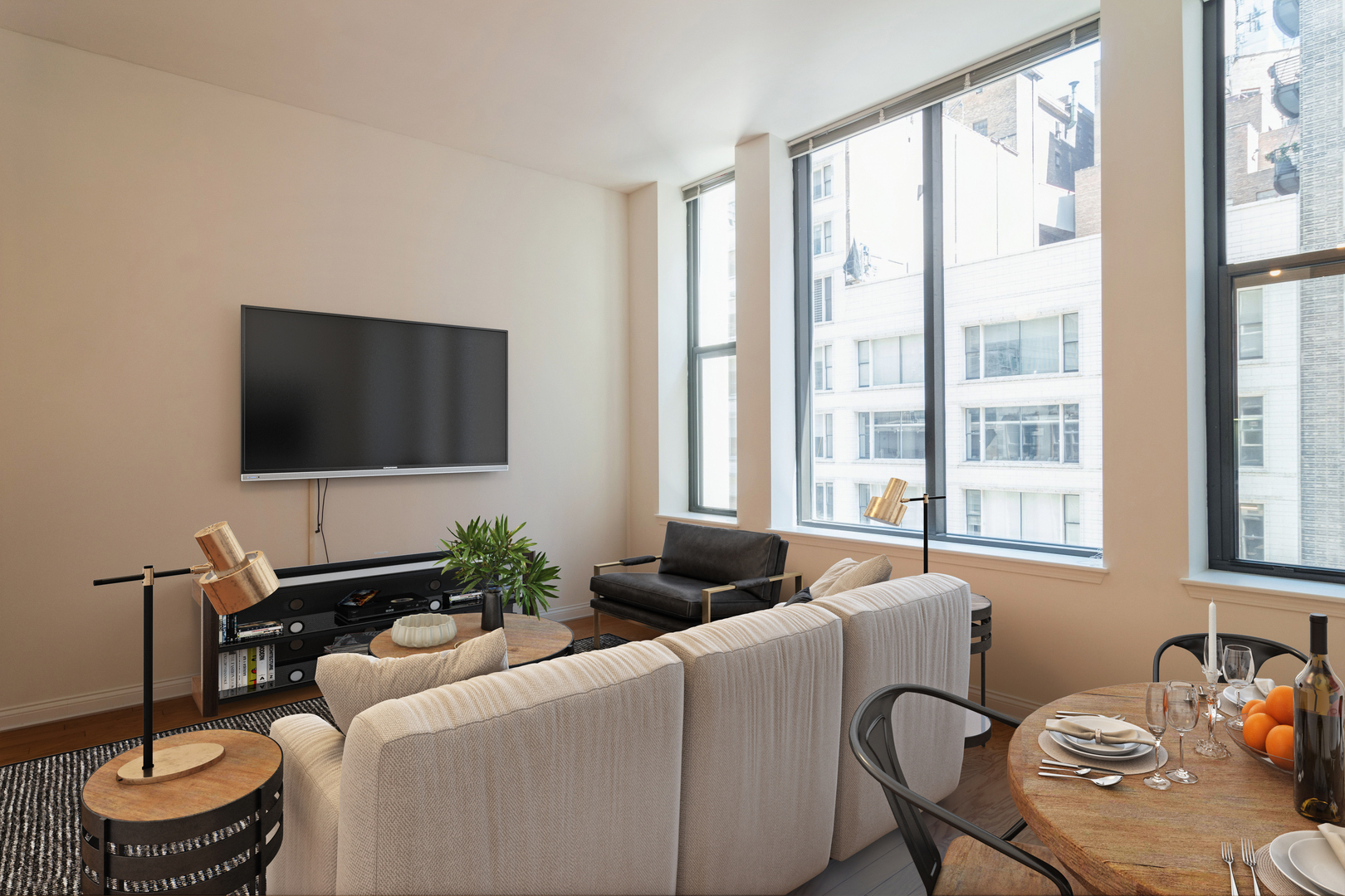 8 West Monroe Street, Unit 705 Chicago, IL 60603 - Photo 3 of 10 a living room with furniture and a flat screen tv