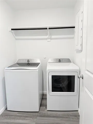 a utility room with dryer and washer