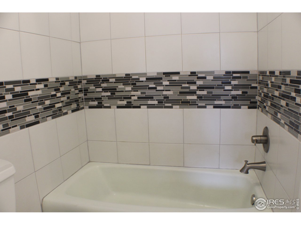 809 East Drake Road, Unit 108 Fort Collins, CO 80525 - Photo 22 of 36 New Tile in Tub/Shower