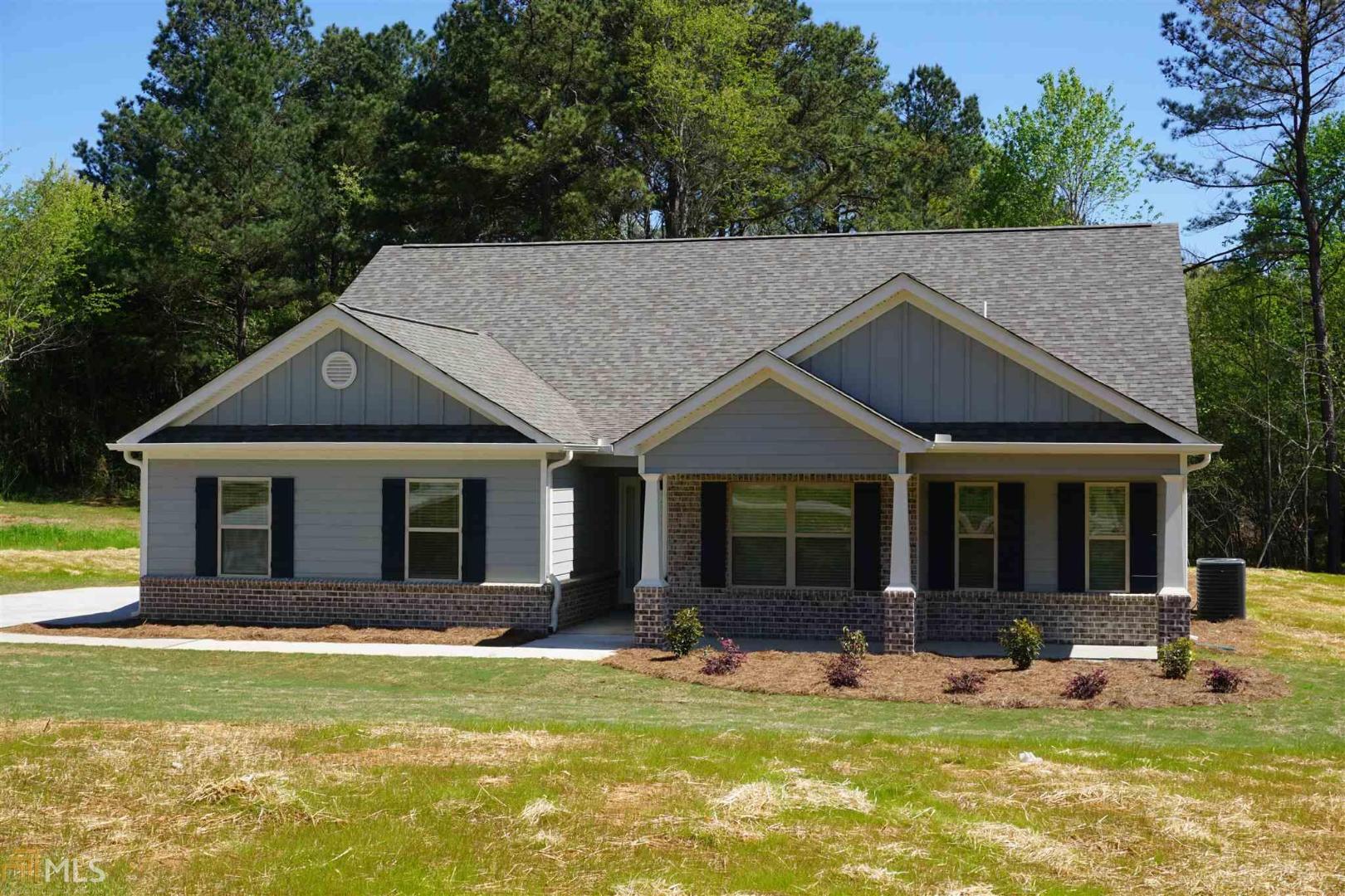 729 Brannon Holder Road, Unit 3 Winder, GA 30680 - Photo 1 of 1 a view of a house with a yard patio and swimming pool