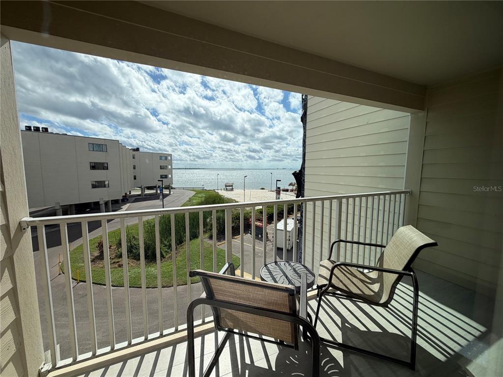 2506 North Rocky Point Drive, Unit 305 Tampa, FL 33607 - Photo 11 of 13 a view of balcony with wooden floor