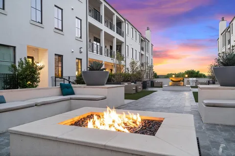 a view of building exterior with seating space