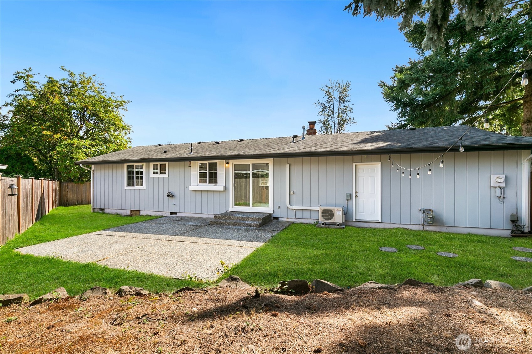 15028 108th Place Northeast Bothell, WA 98011 - Photo 3 of 26 a view of a yard with a house
