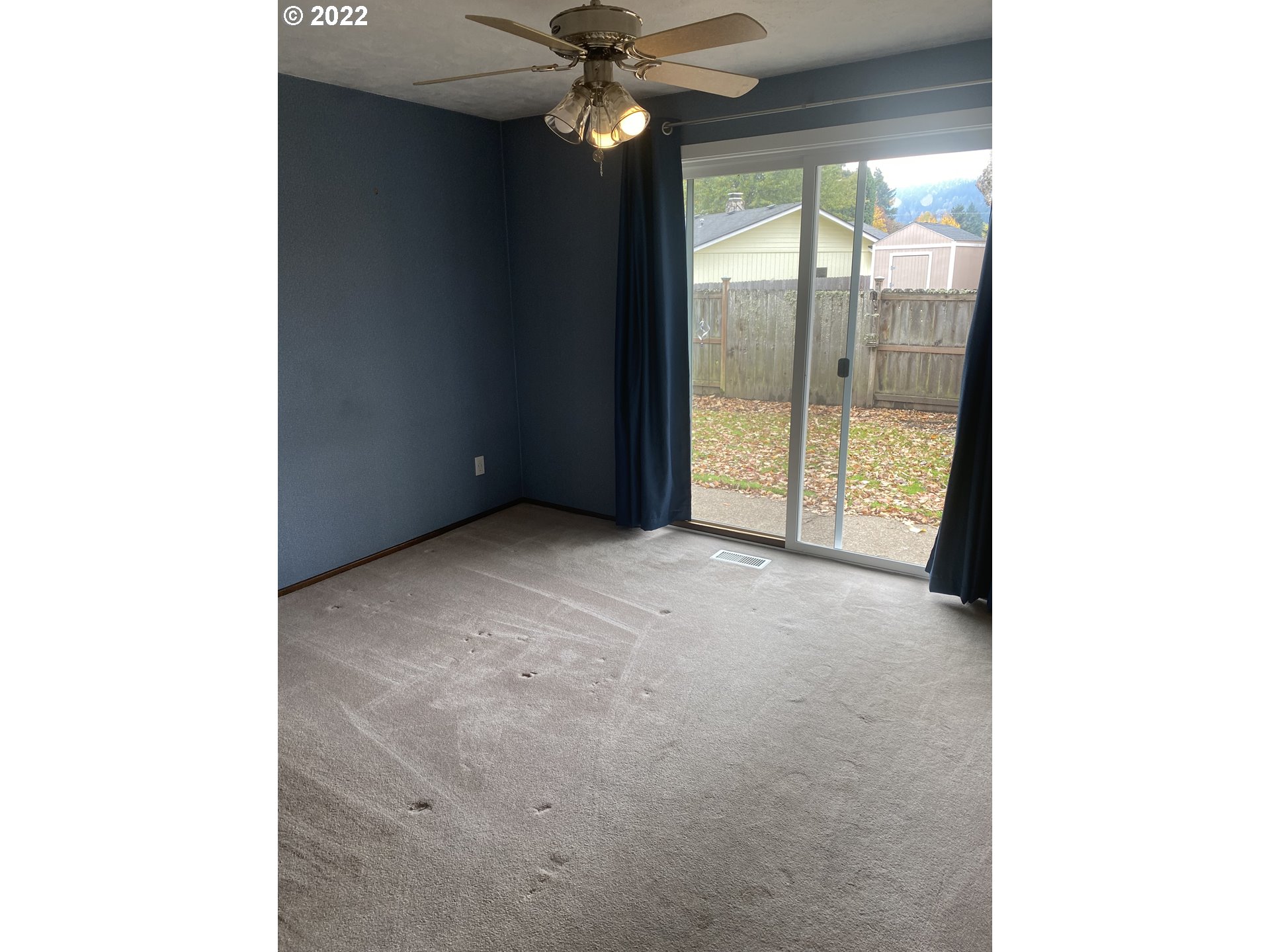 1023 65th Street Springfield, OR 97478 - Photo 12 of 23 a view of an empty room with a window