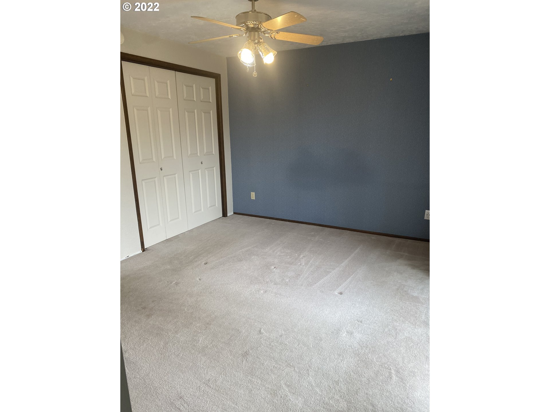 1023 65th Street Springfield, OR 97478 - Photo 13 of 23 a view of a room with a ceiling fan