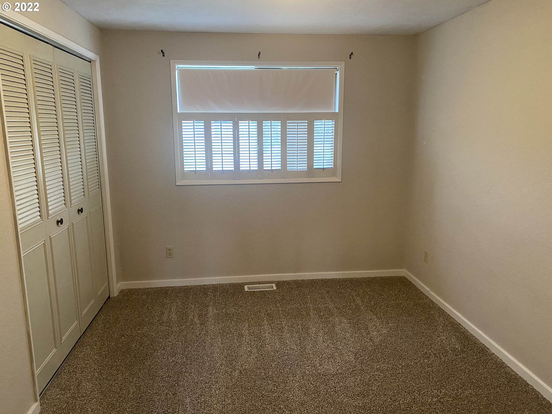 1023 65th Street Springfield, OR 97478 - Photo 14 of 23 an empty room with a window