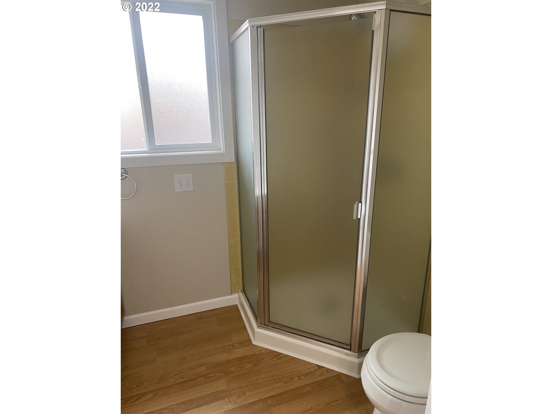 1023 65th Street Springfield, OR 97478 - Photo 18 of 23 a bathroom with a toilet and a shower