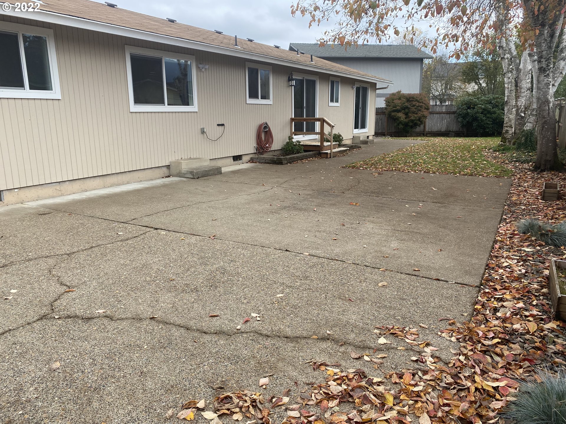 1023 65th Street Springfield, OR 97478 - Photo 21 of 23 a view of a house with backyard