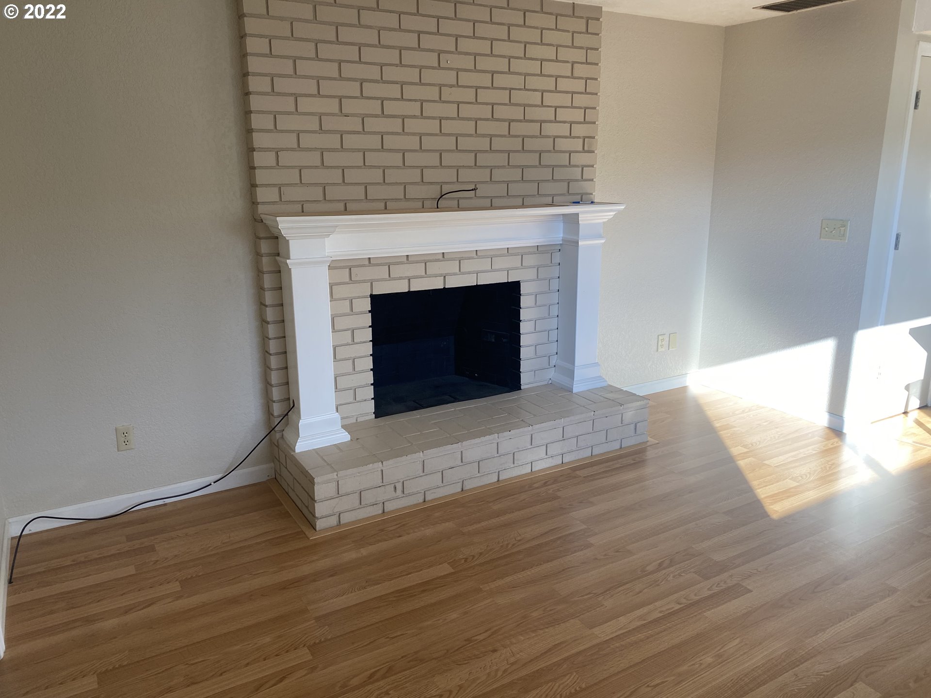 1023 65th Street Springfield, OR 97478 - Photo 7 of 23 a living room with a fireplace