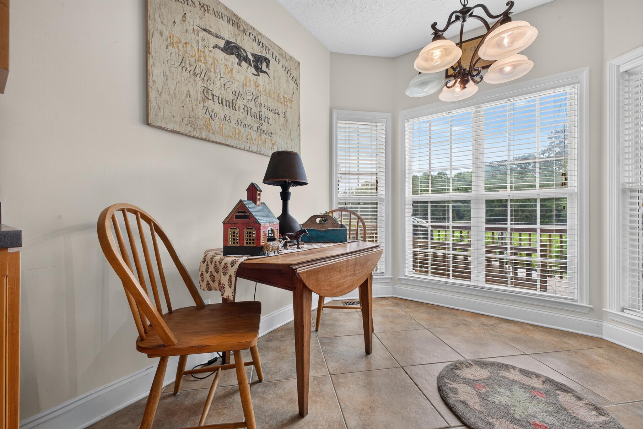 42 Emerald Ridge Aiken, SC 29803 - Photo 12 of 33 a dining room with furniture and window