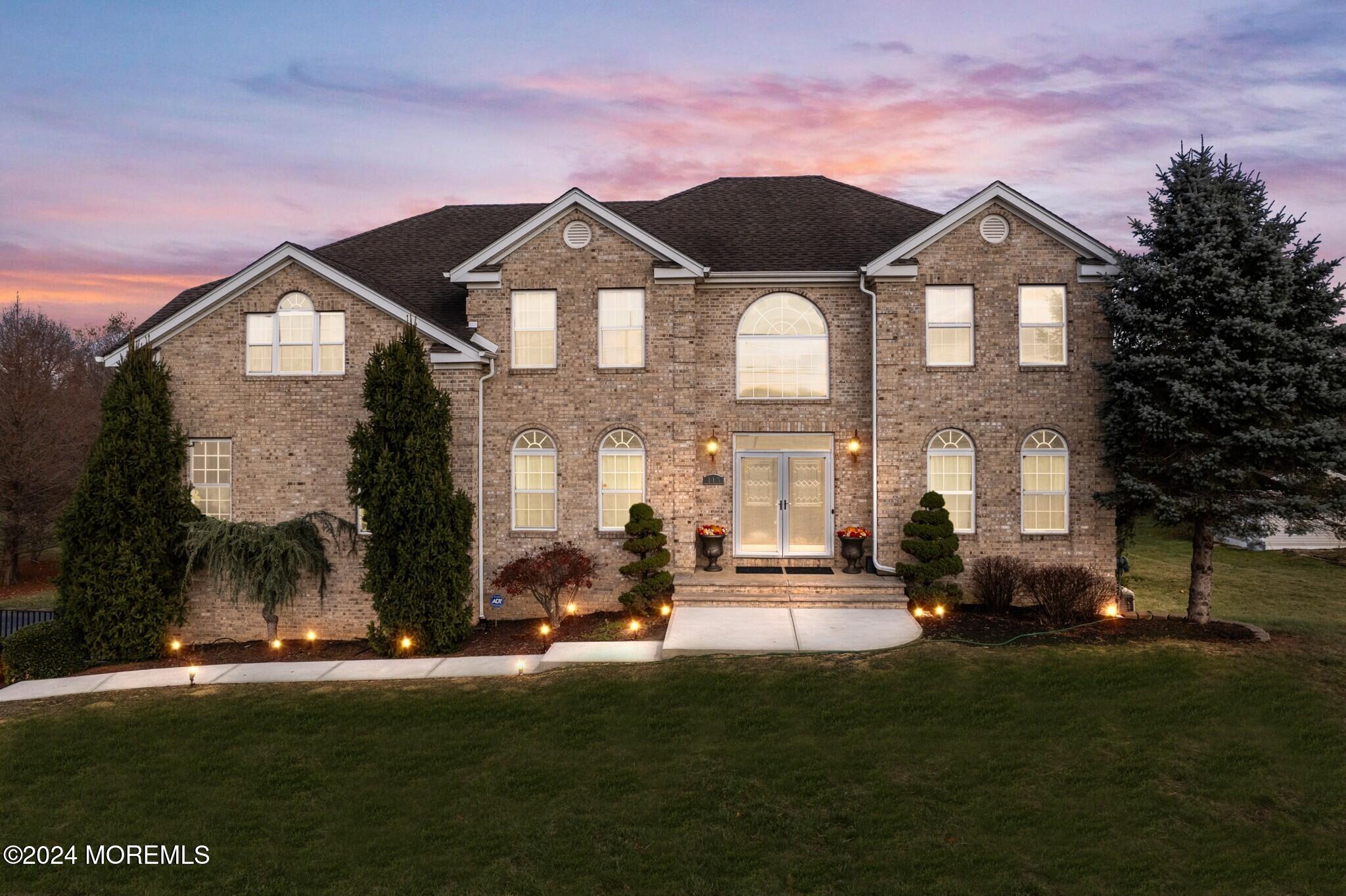 115 Holmes Mill Road Cream Ridge, NJ 08514 - Photo 1 of 49 a front view of a house with a yard