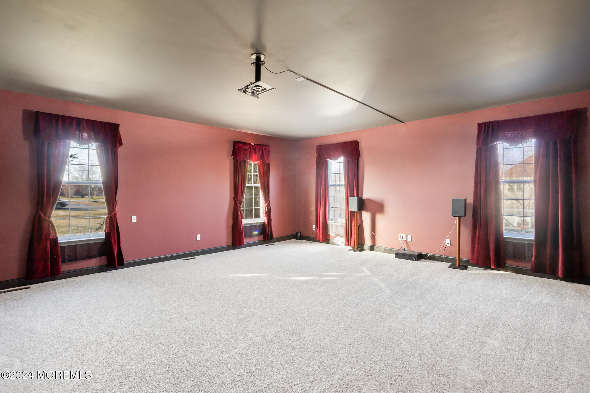 115 Holmes Mill Road Cream Ridge, NJ 08514 - Photo 12 of 49 a view of an empty room with window and a kitchen