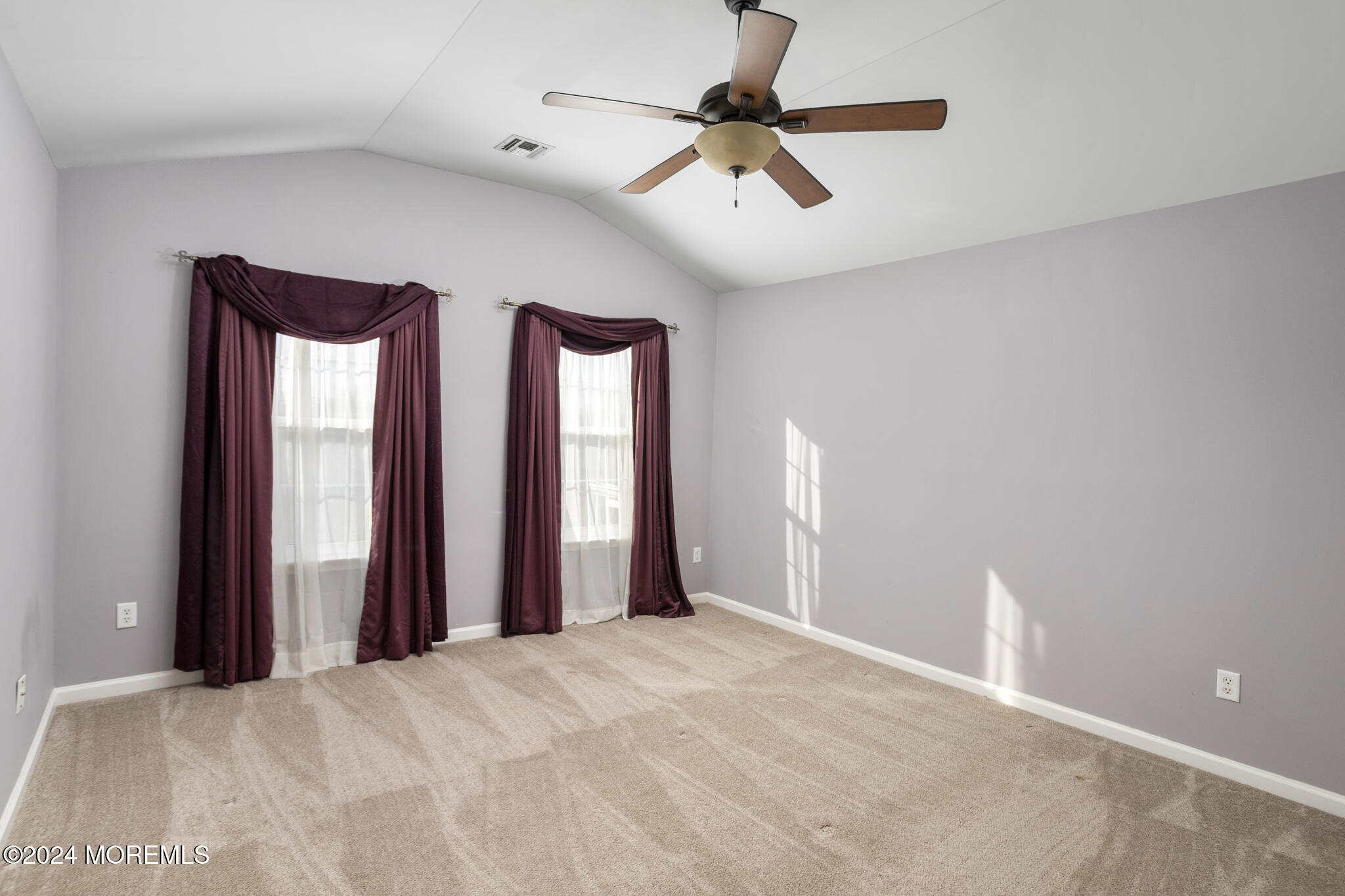 115 Holmes Mill Road Cream Ridge, NJ 08514 - Photo 27 of 49 a view of a livingroom with a ceiling fan and window