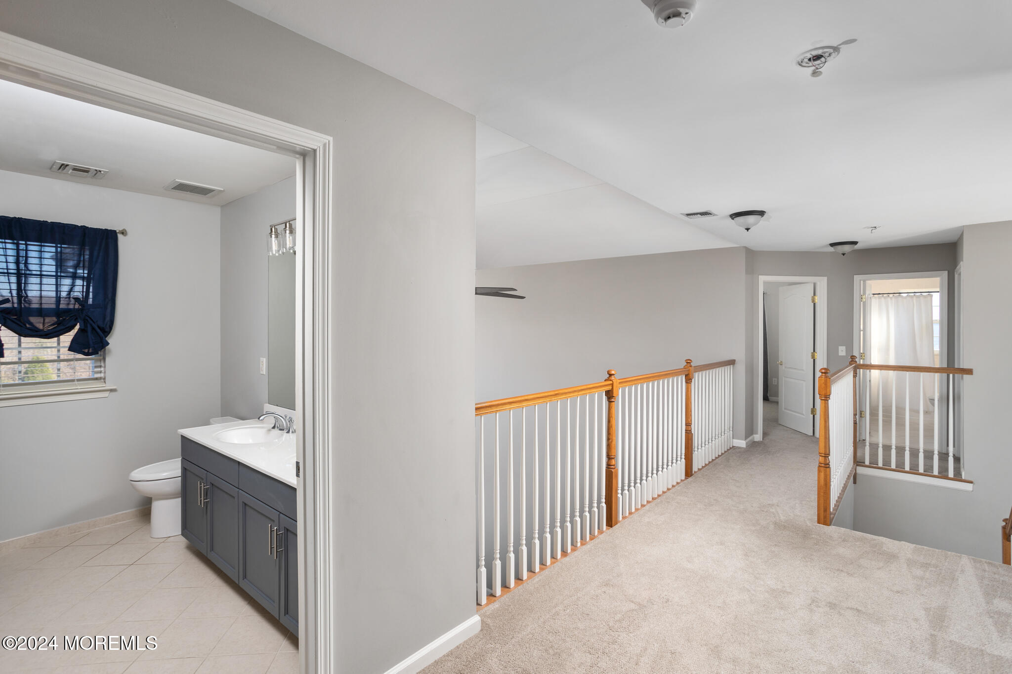 115 Holmes Mill Road Cream Ridge, NJ 08514 - Photo 28 of 49 a view of hallway with chandelier