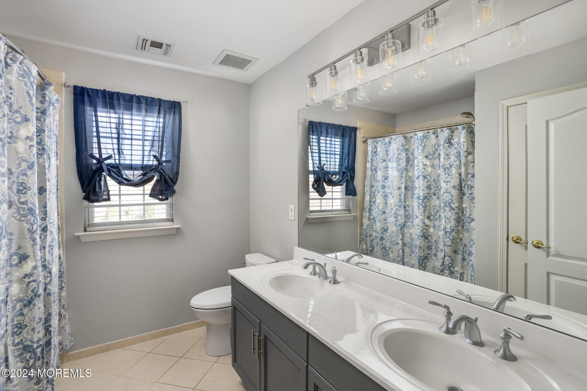 115 Holmes Mill Road Cream Ridge, NJ 08514 - Photo 29 of 49 a bathroom with a toilet sink and mirror