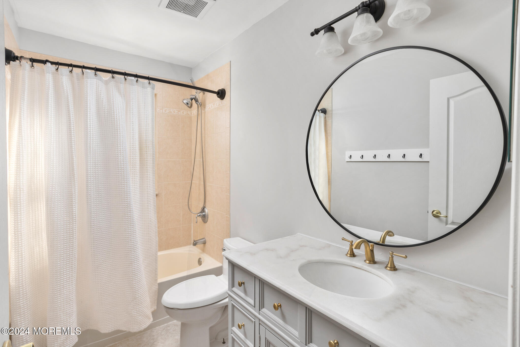 115 Holmes Mill Road Cream Ridge, NJ 08514 - Photo 32 of 49 a bathroom with a sink a toilet and a mirror