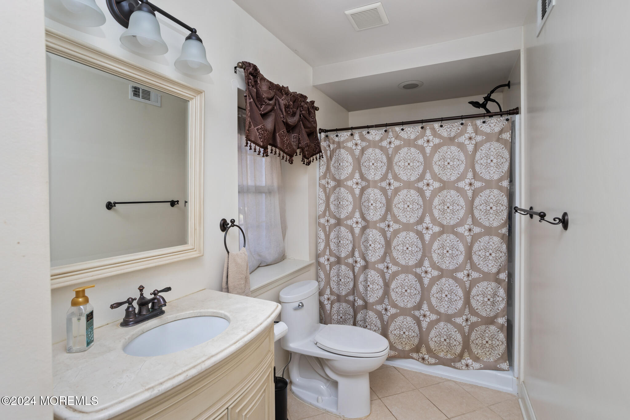 115 Holmes Mill Road Cream Ridge, NJ 08514 - Photo 38 of 49 a bathroom with a sink toilet and shower