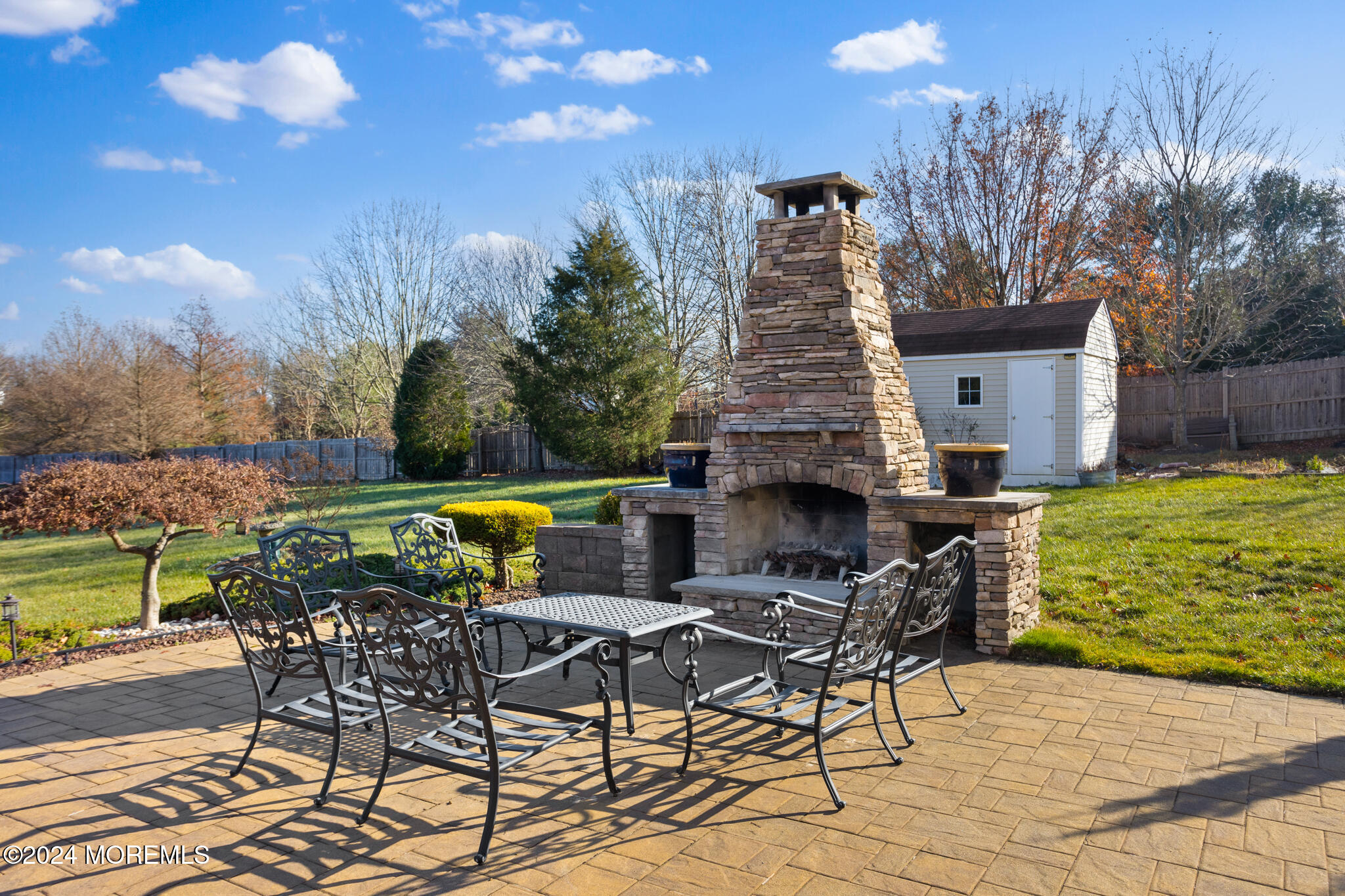 115 Holmes Mill Road Cream Ridge, NJ 08514 - Photo 44 of 49 a view of a chairs and table on the terrace