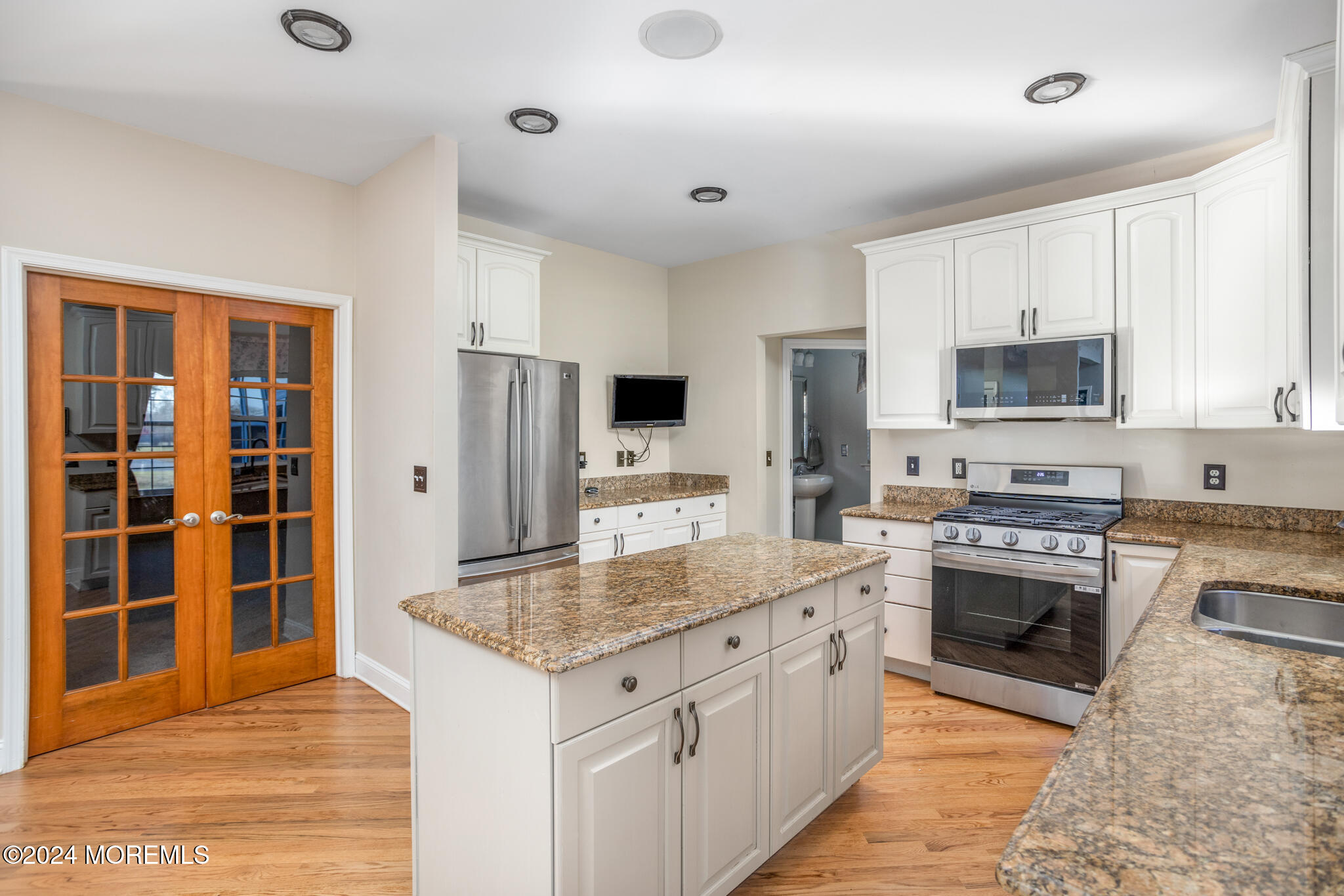 115 Holmes Mill Road Cream Ridge, NJ 08514 - Photo 10 of 49 a kitchen with stainless steel appliances granite countertop a stove and a sink