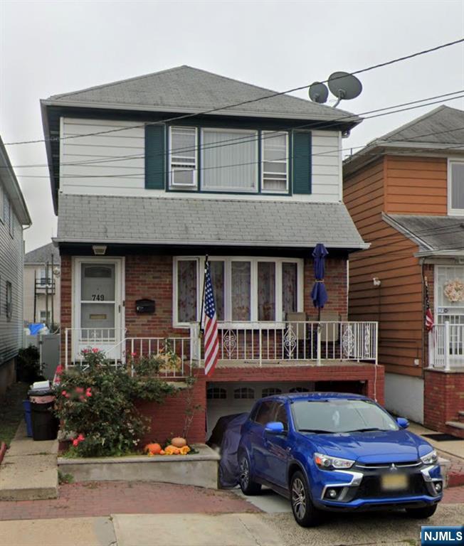 a car parked in front of a house