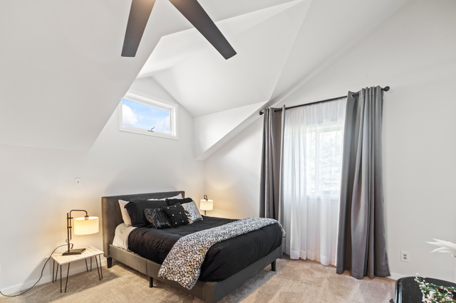 460 Omni Point Road Central Valley, UT 84754 - Photo 58 of 101 Bright bedroom with vaulted ceilings and a ceiling fan