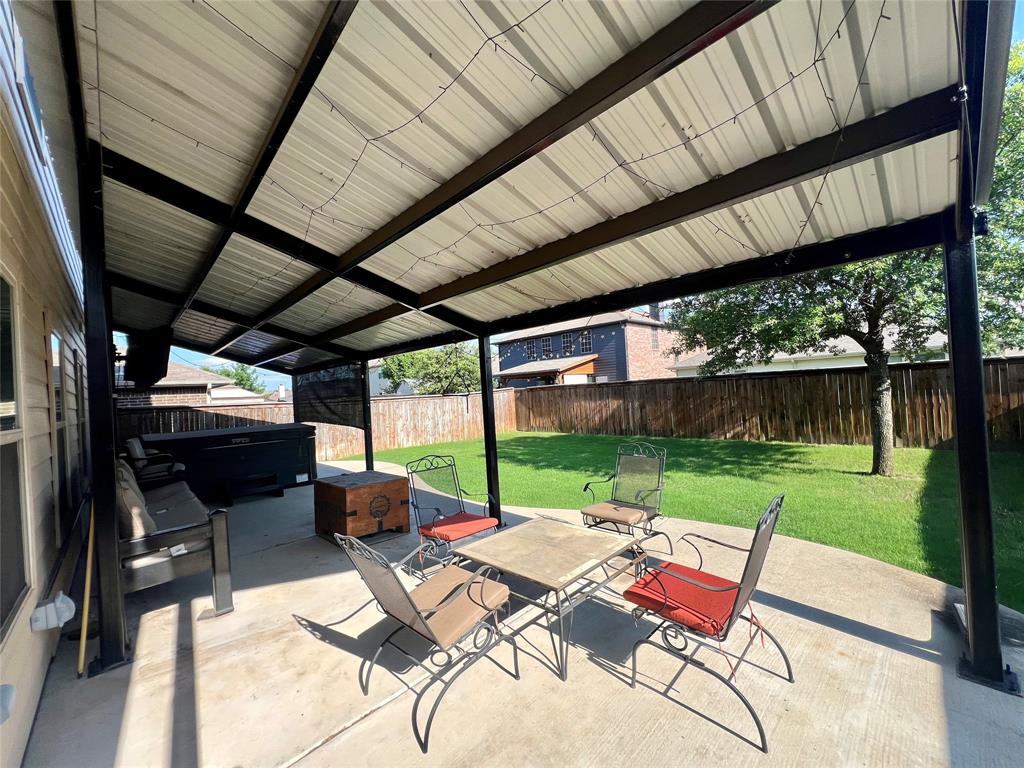 484 Harding Lane Lavon, TX 75166 - Photo 19 of 38 a patio with garden area