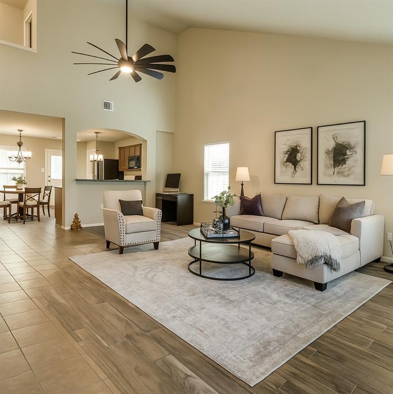 484 Harding Lane Lavon, TX 75166 - Photo 6 of 38 a living room with furniture and a flat screen tv