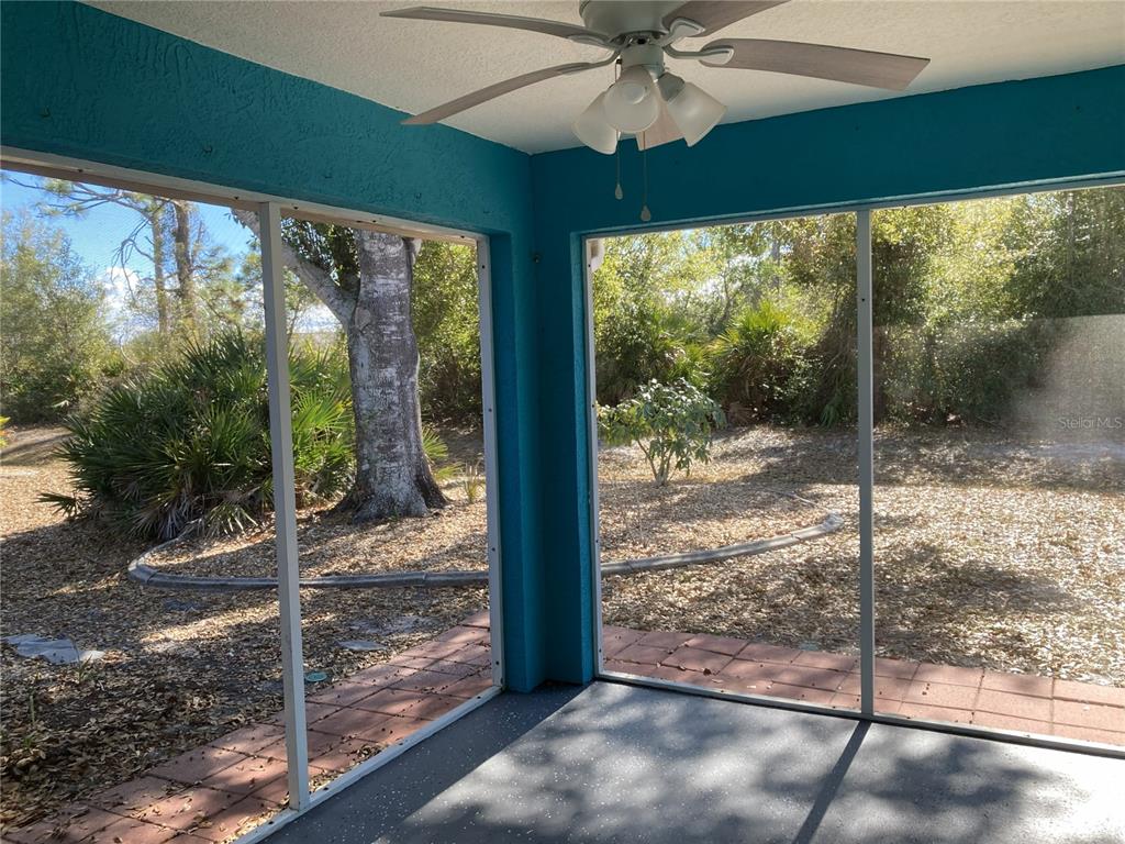 1088 Nomad Road Punta Gorda, FL 33983 - Photo 11 of 13 a view of a room with a large window