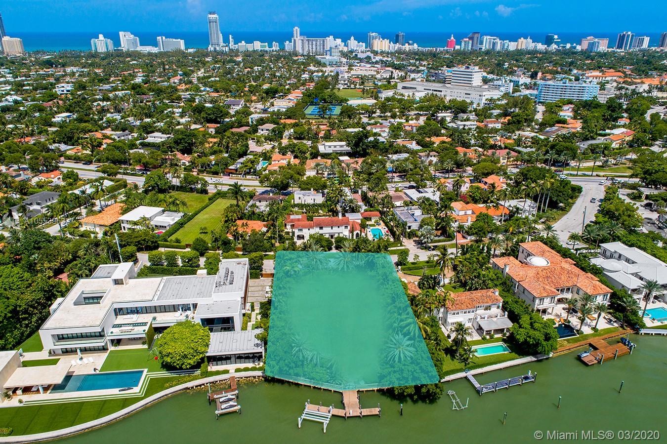 4350 North Bay Road Miami Beach, FL 33140 - Photo 4 of 5 an aerial view of residential houses with outdoor space and street view