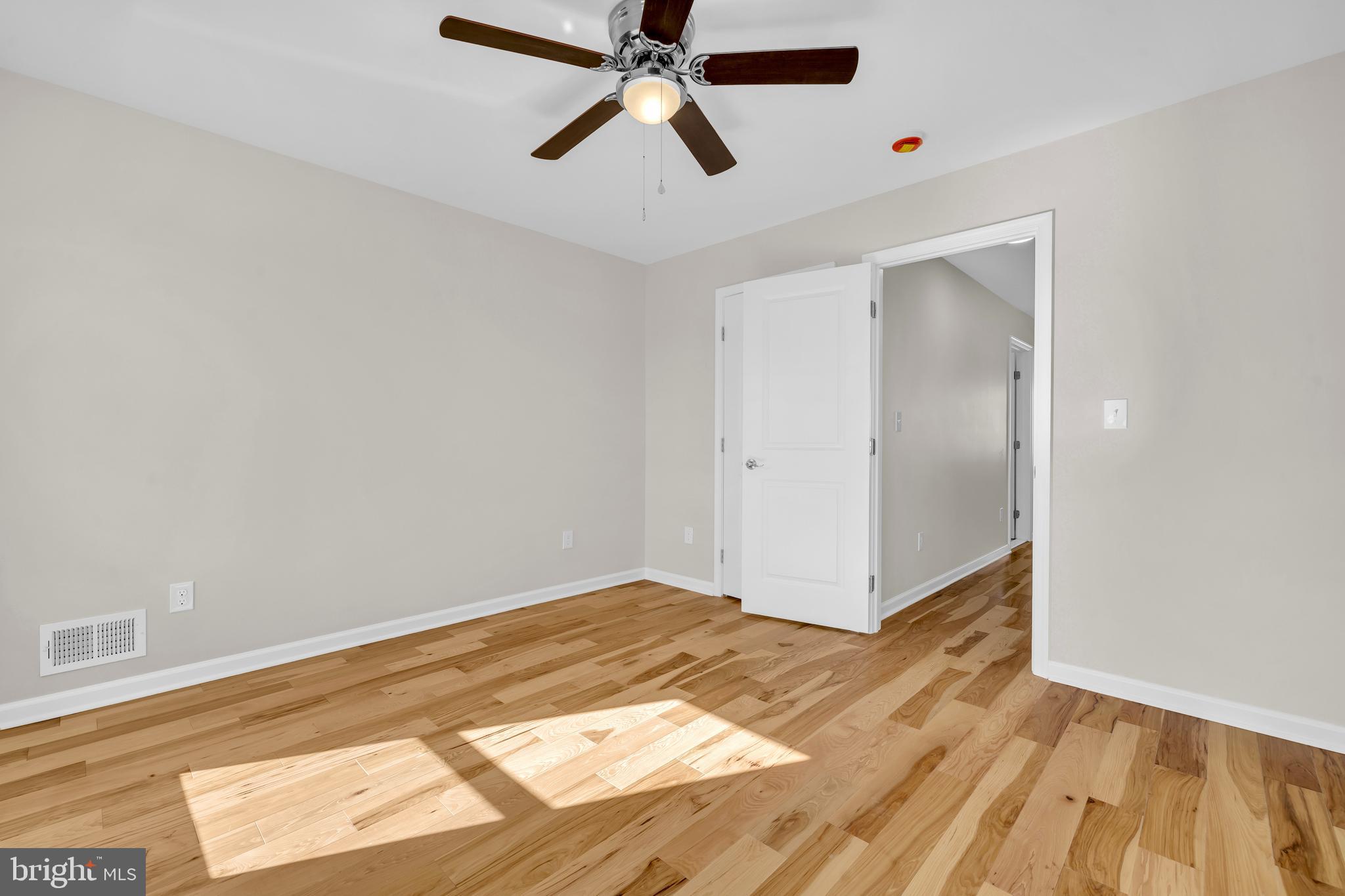 1626 Hazel Street Curtis Bay, MD 21226 - Photo 17 of 24 a view of empty room with wooden floor