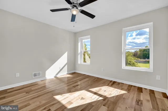 a view of an empty room and window