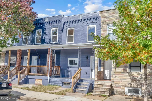 a front view of a building with street view