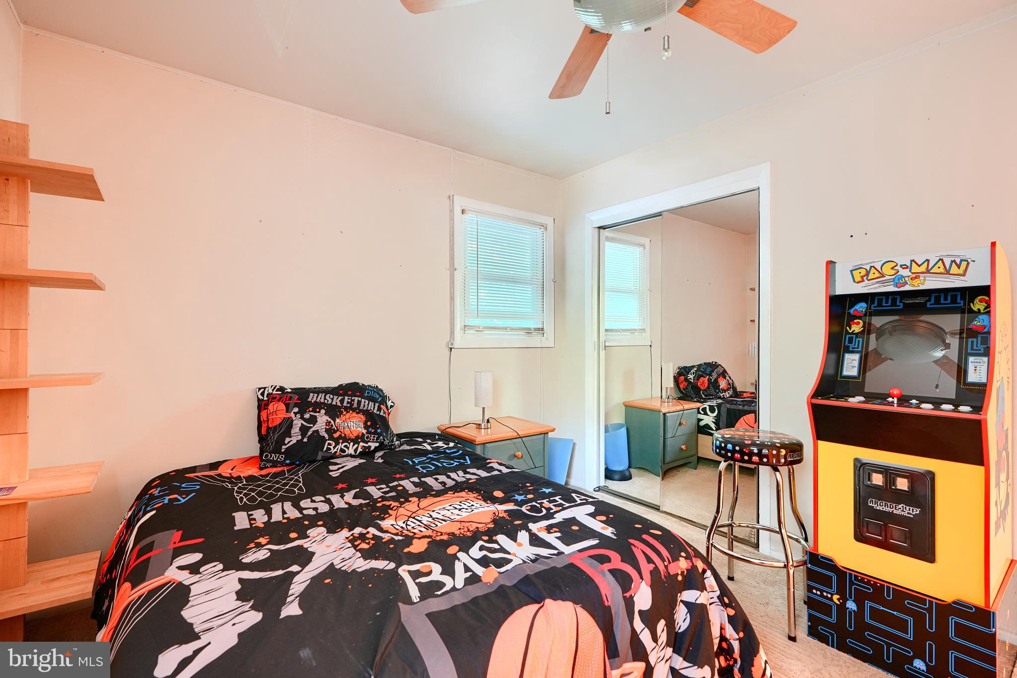 6065 Poplar Road St. Leonard, MD 20685 - Photo 30 of 50 a bed room with a bed and a chair