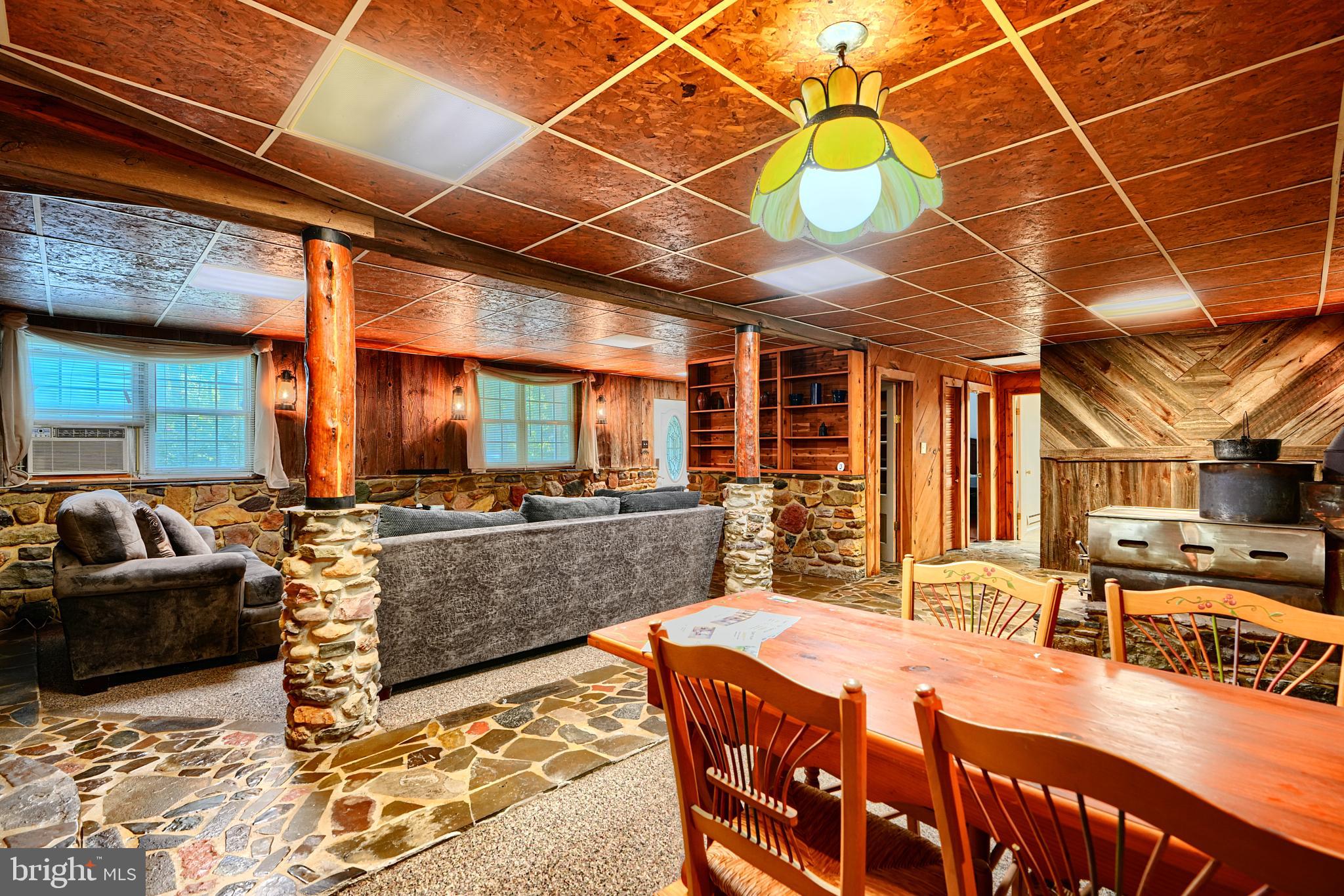 6065 Poplar Road St. Leonard, MD 20685 - Photo 38 of 50 a view of a dining hall with many windows