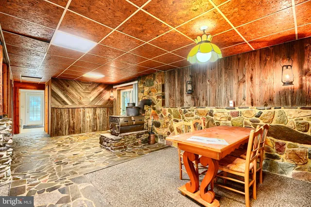 a view of a patio with a table and chairs