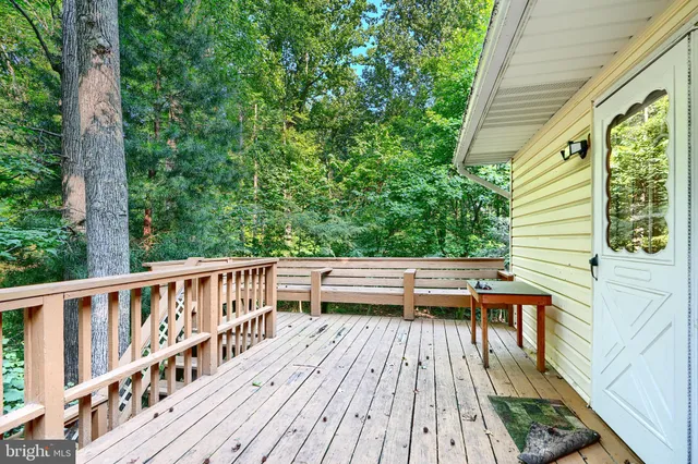a view of balcony with wooden floor and outdoor space
