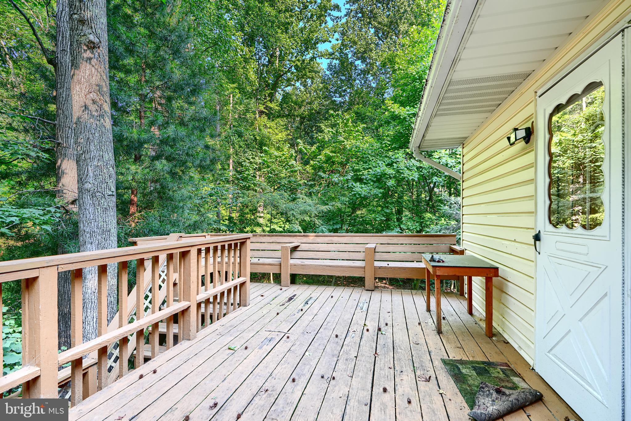 6065 Poplar Road St. Leonard, MD 20685 - Photo 6 of 50 a view of balcony with wooden floor and outdoor space