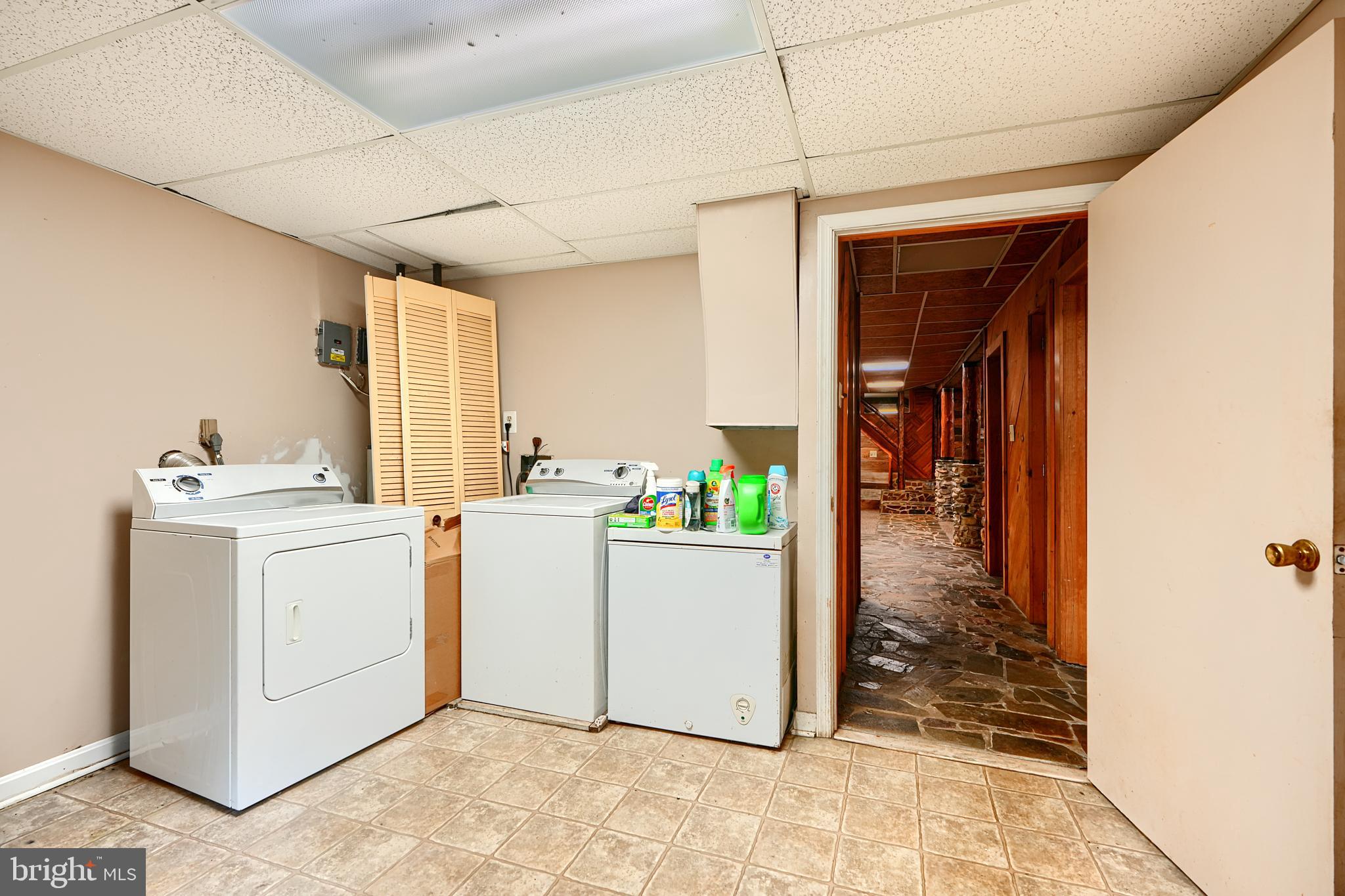 6065 Poplar Road St. Leonard, MD 20685 - Photo 9 of 50 a room with storage and utility