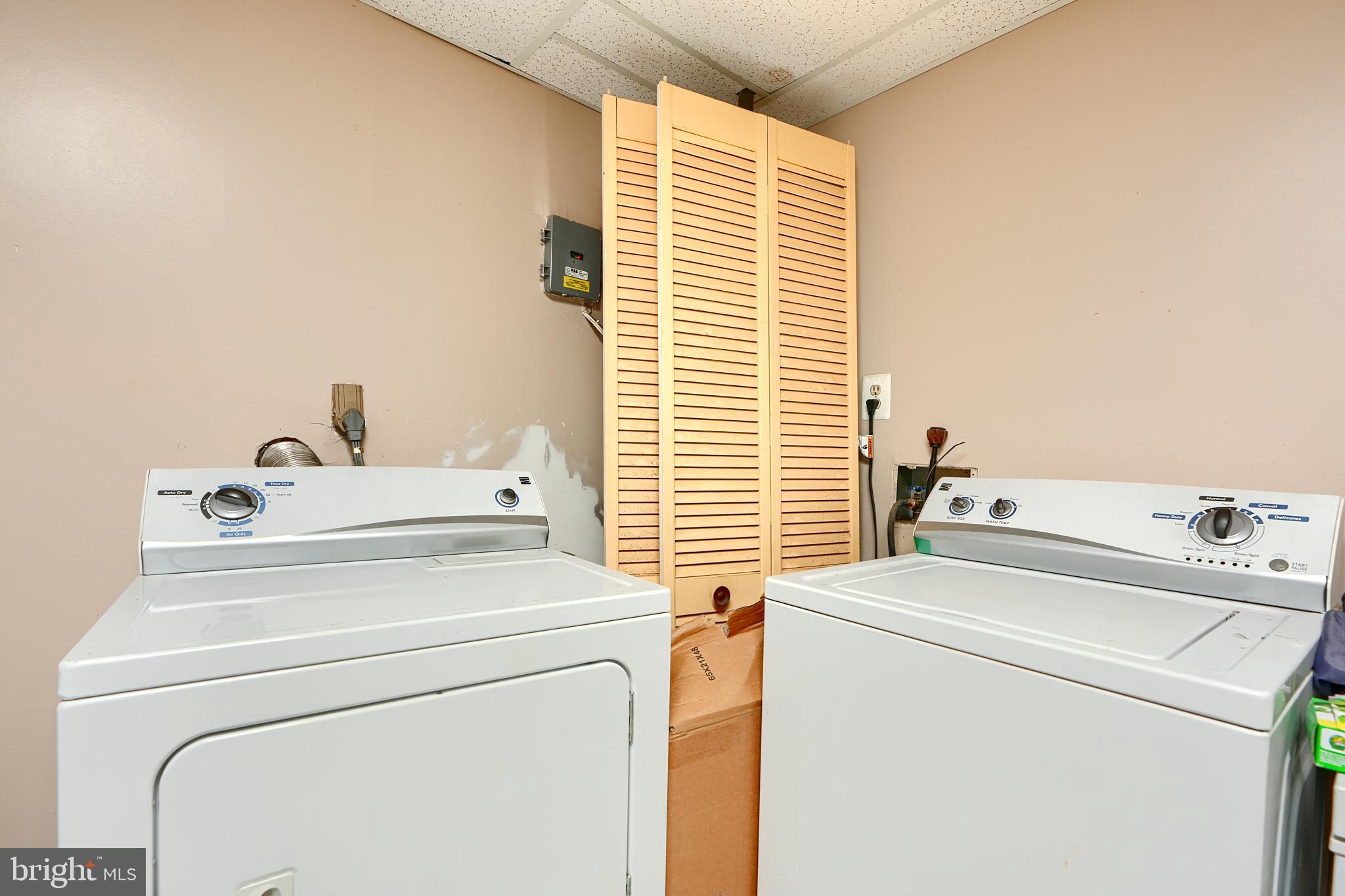 6065 Poplar Road St. Leonard, MD 20685 - Photo 10 of 50 a utility room with dryer and washer