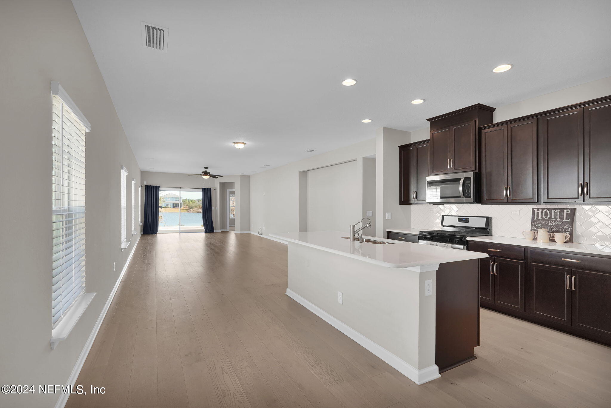 88 Ferndale Way St. Augustine, FL 32092 - Photo 8 of 56 Kitchen to Family Room View