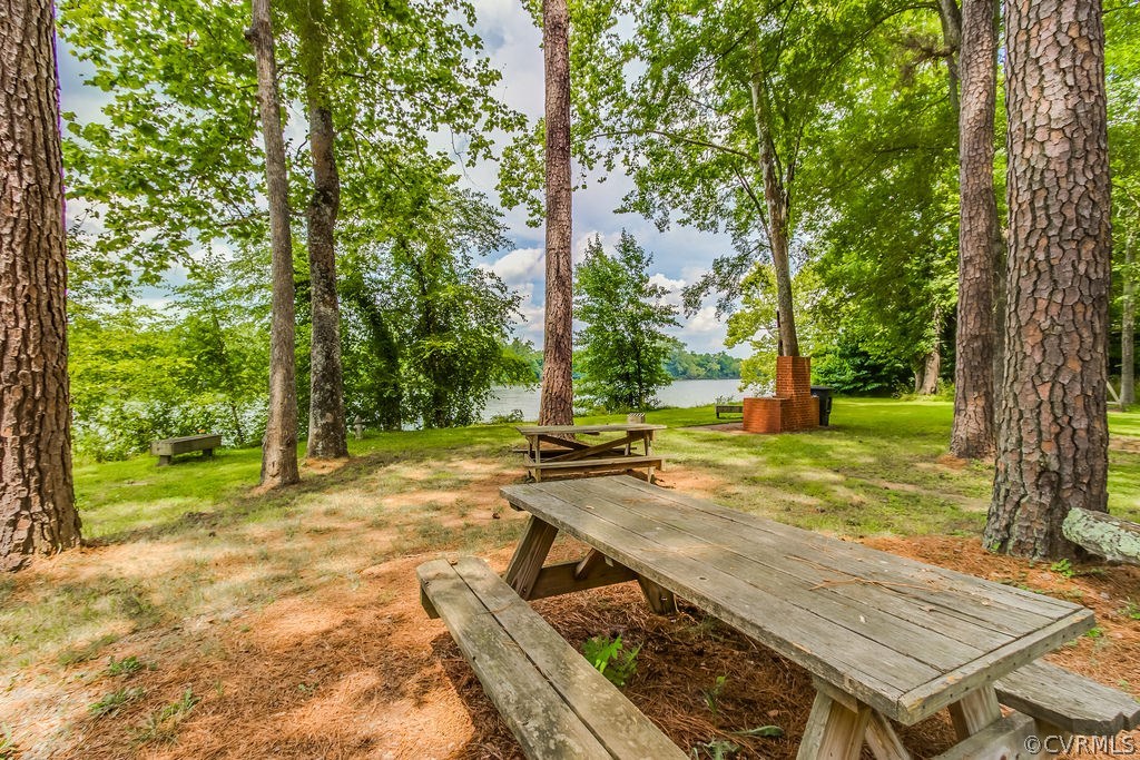 3901 Old Gun Road West Midlothian, VA 23113 - Photo 11 of 16 a view of a backyard with sitting area