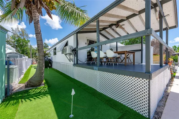 a view of a porch with a yard