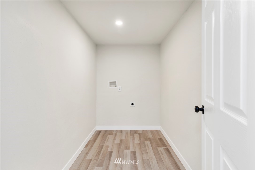 3012 Southwest 102nd Street Seattle, WA 98146 - Photo 26 of 32 a view of a small space with wooden floor