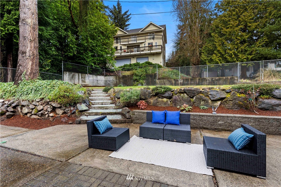 3012 Southwest 102nd Street Seattle, WA 98146 - Photo 28 of 32 a building outdoor space with patio couch and potted plants