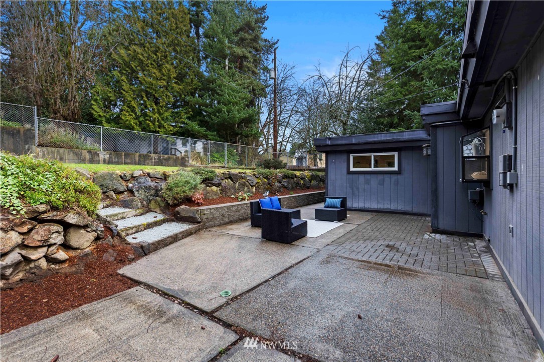 3012 Southwest 102nd Street Seattle, WA 98146 - Photo 29 of 32 a view of a backyard with sitting area